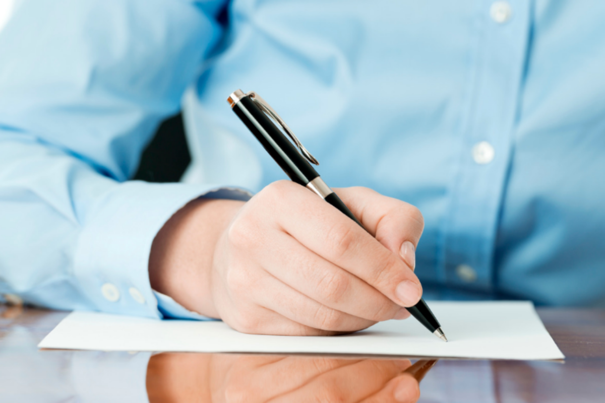 Business man filling out a form